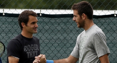 Federer e Del Potro, foto Reuters Federer e Del Potro, foto Reuters