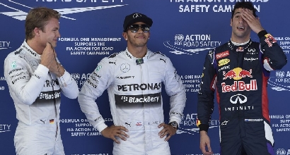 Lewis Hamilton con Rosberg e Ricciardo (Afp) Lewis Hamilton con Rosberg e Ricciardo (Afp)