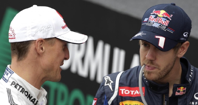 Schumacher e Vettel (LaPresse) Schumacher e Vettel (LaPresse)