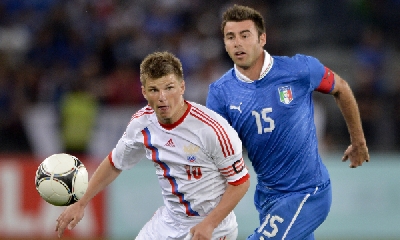 Barzagli con Arshavin (Afp) Barzagli con Arshavin (Afp)